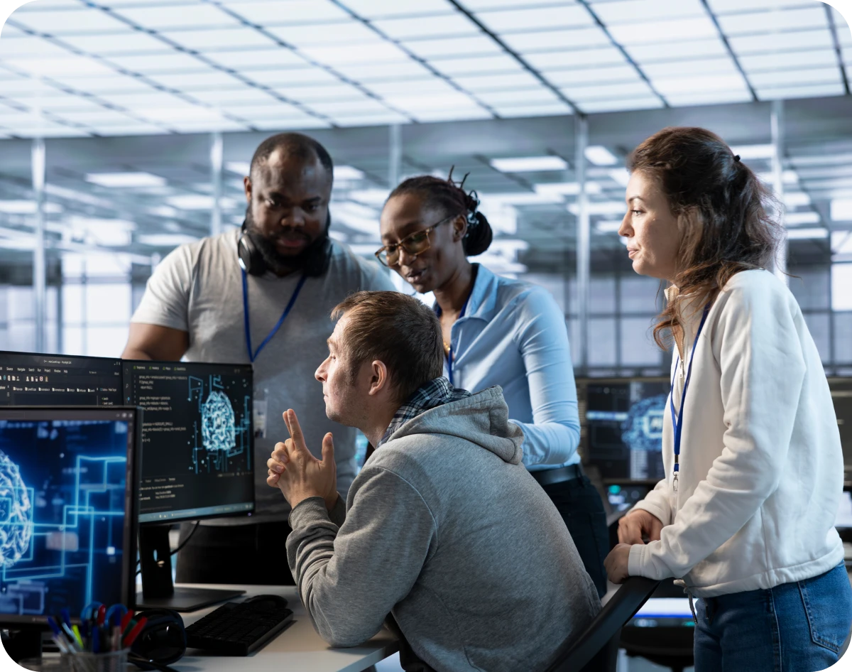 Group discussing computer project