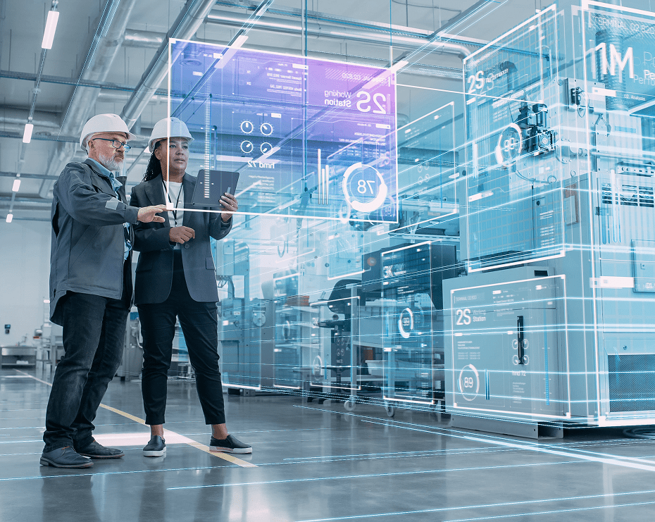 Workers reviewing holographic manufacturing data